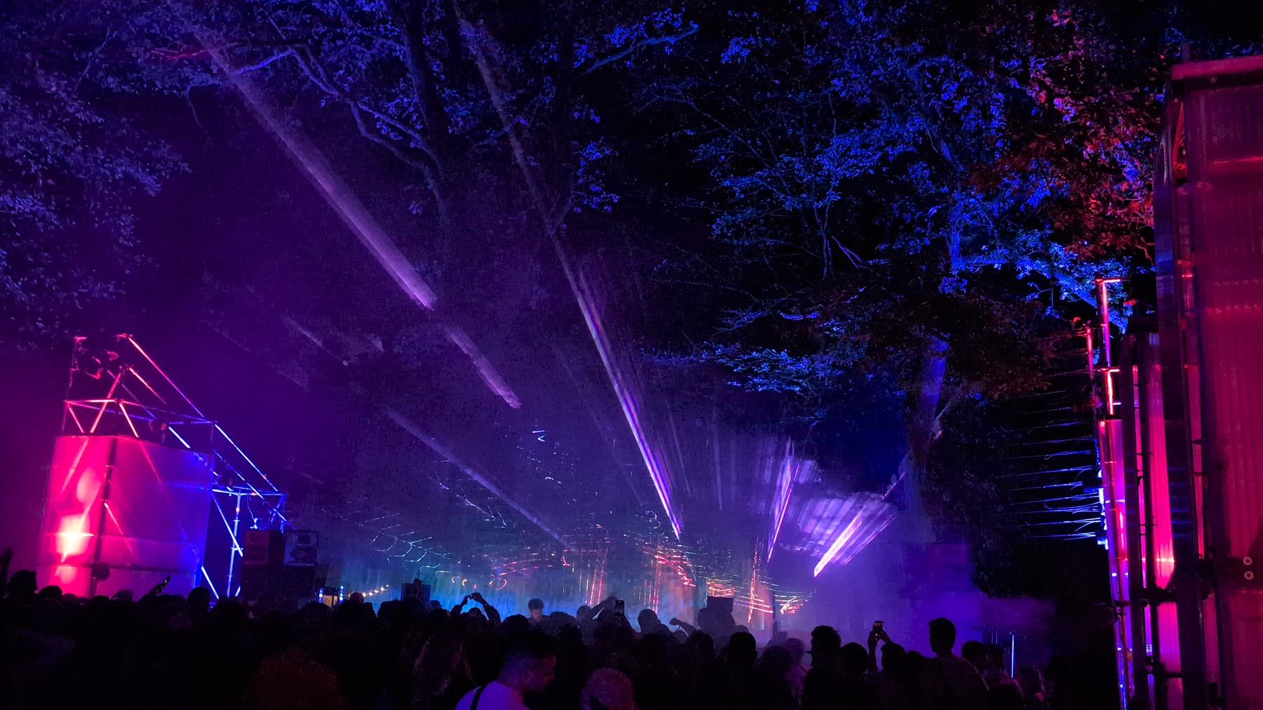 Main stage, laser beams in coloured tulle